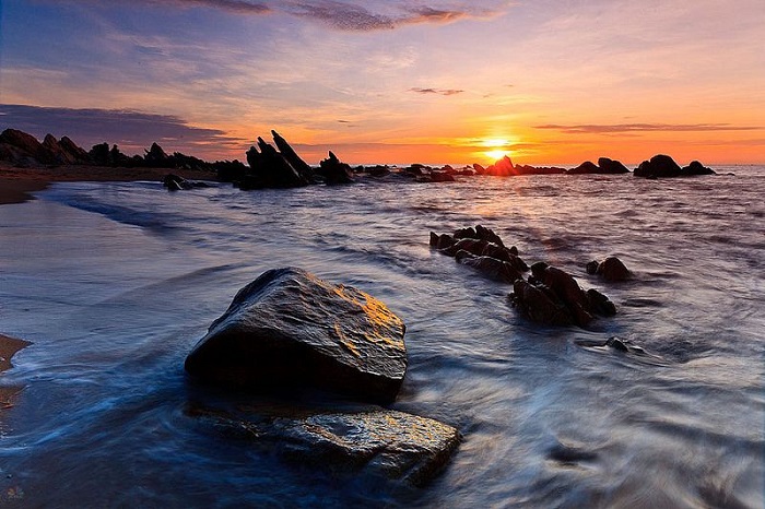 Watching sunrise and sunset at the beach