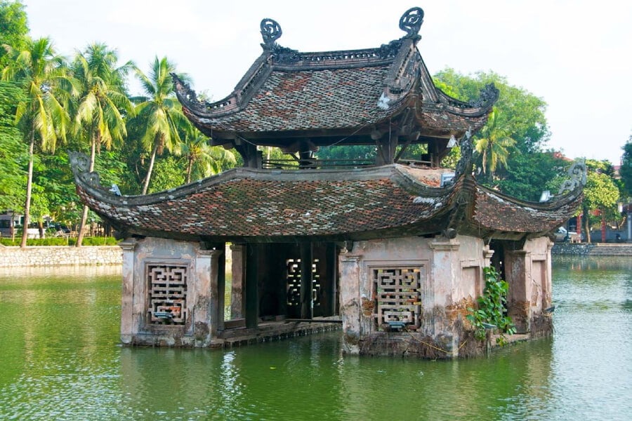 Historic One Pillar Pagoda surrounded by a lotus pond in Hanoi
