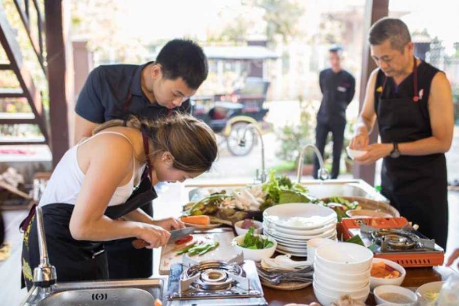 Take a Local Cooking Class or Market Food Tour